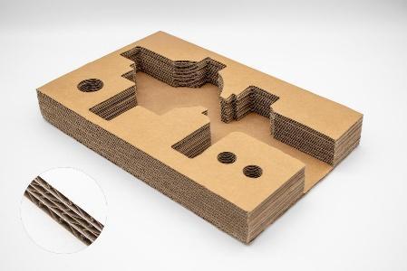 Corrugated build-up block nest with laminated flute detail