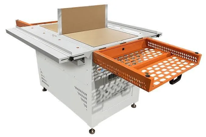 Foam hot plate on a white cabinet with an orange pull-out tray